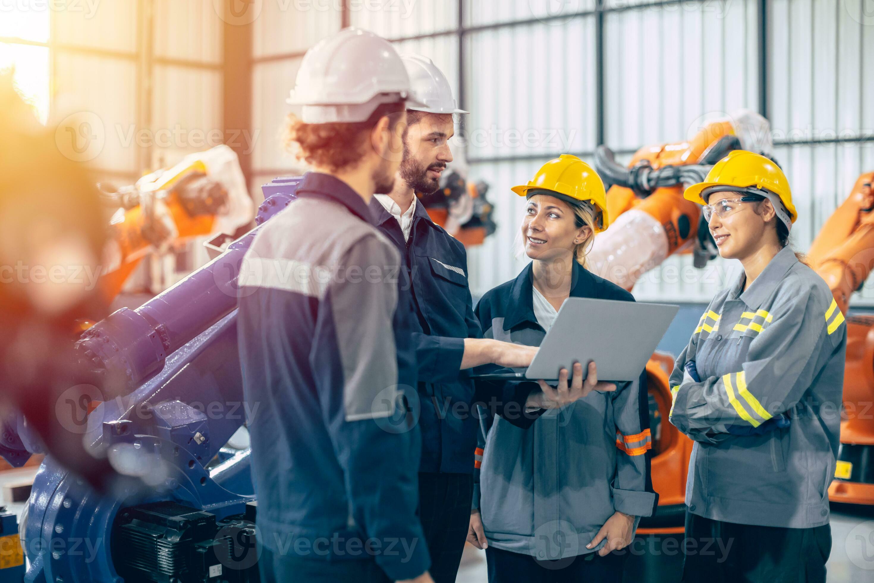 Professional engineering team at industrial facility
